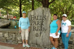 Falls Park South Carolina Women With Sign