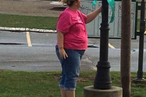Blissfield Michigan Woman Looking At Ribbon