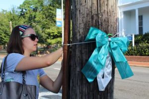 Newark-placing-ribbon